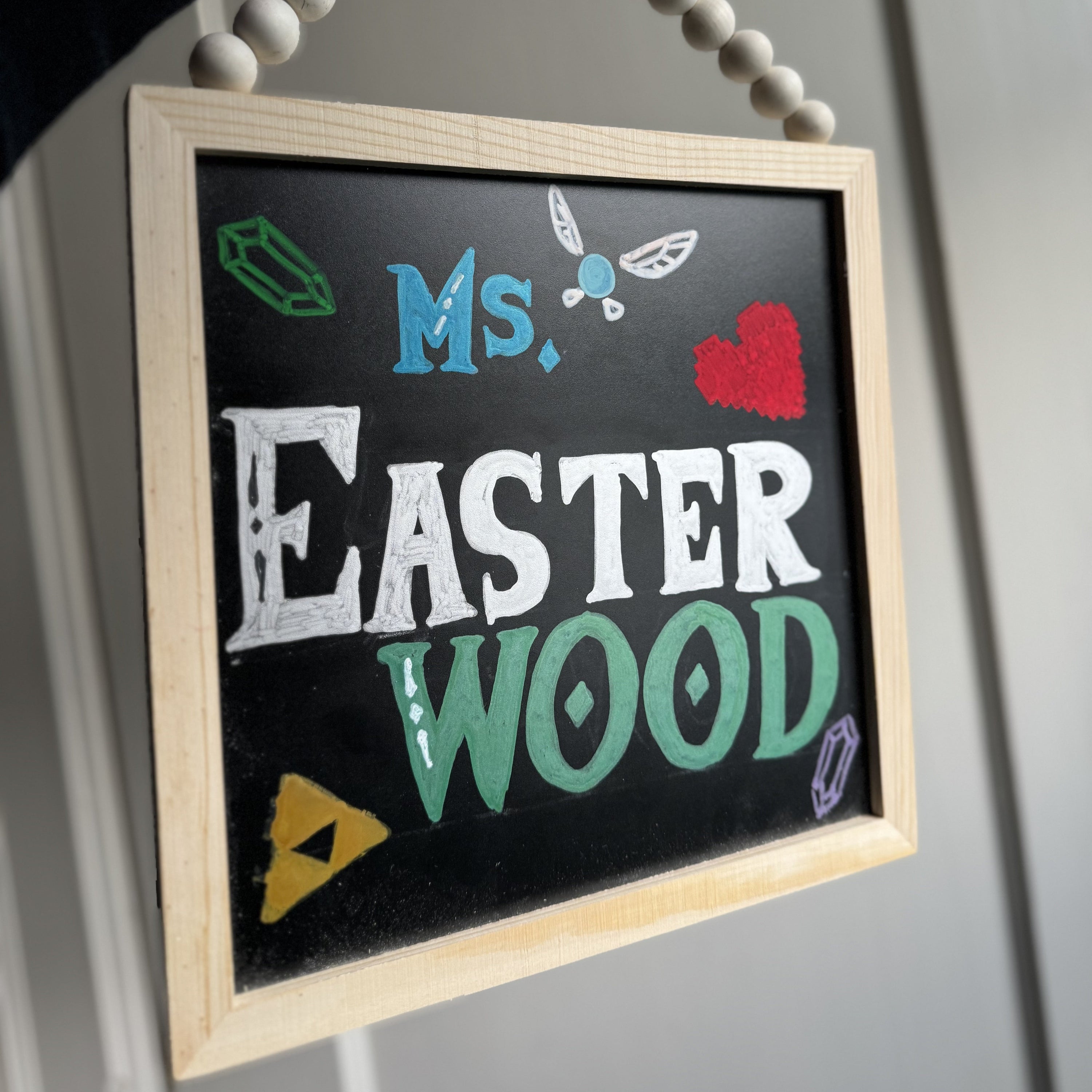 Chalkboard with Legend of Zelda-inspired lettering for a teacher