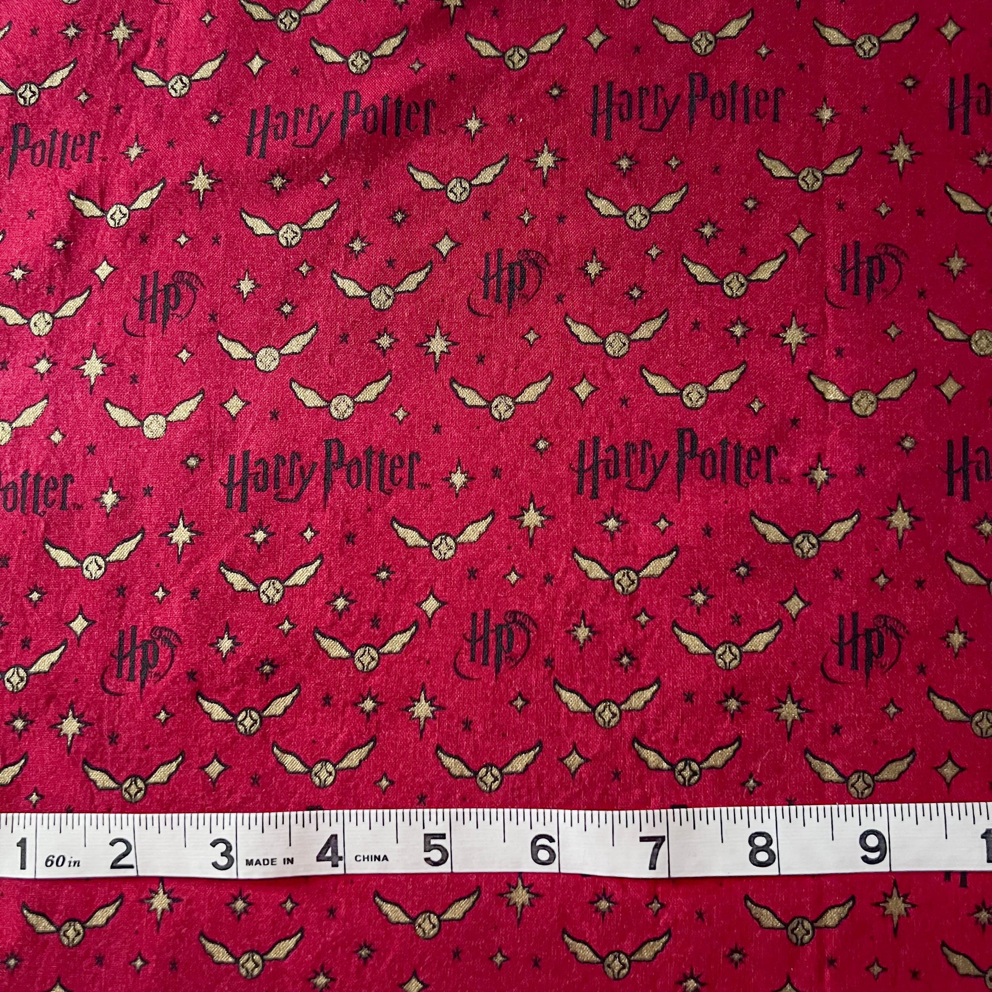 Harry Potter - Crimson and Gold Snitch Fabric - Out of Print - 1 Yard