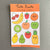 Cute Fruits sticker sheet on a grey background